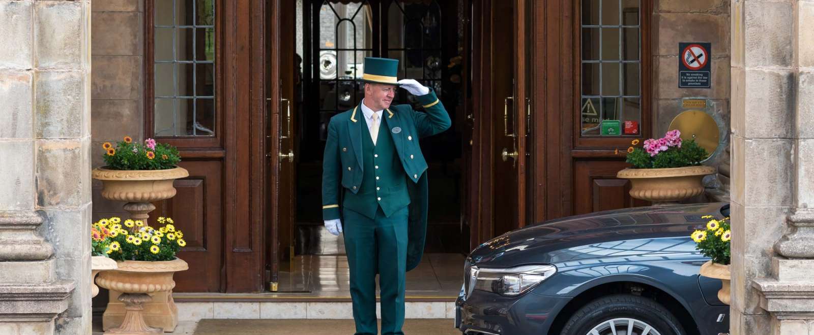 Victoria Hotel Doorman Greeting Arriving Car